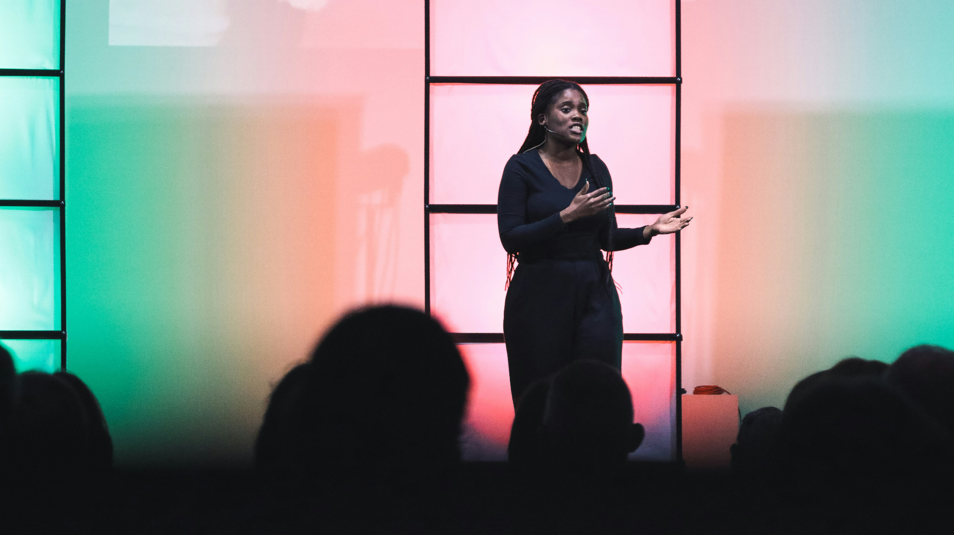 Young woman speaking confidently to an audience